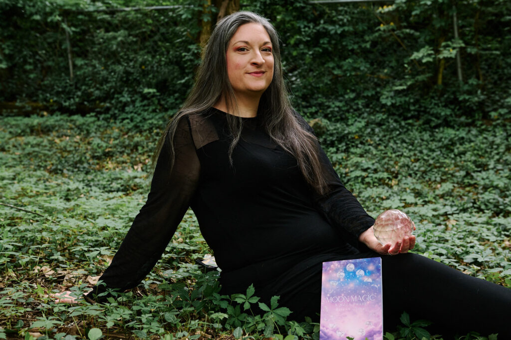 CJ in grass with book